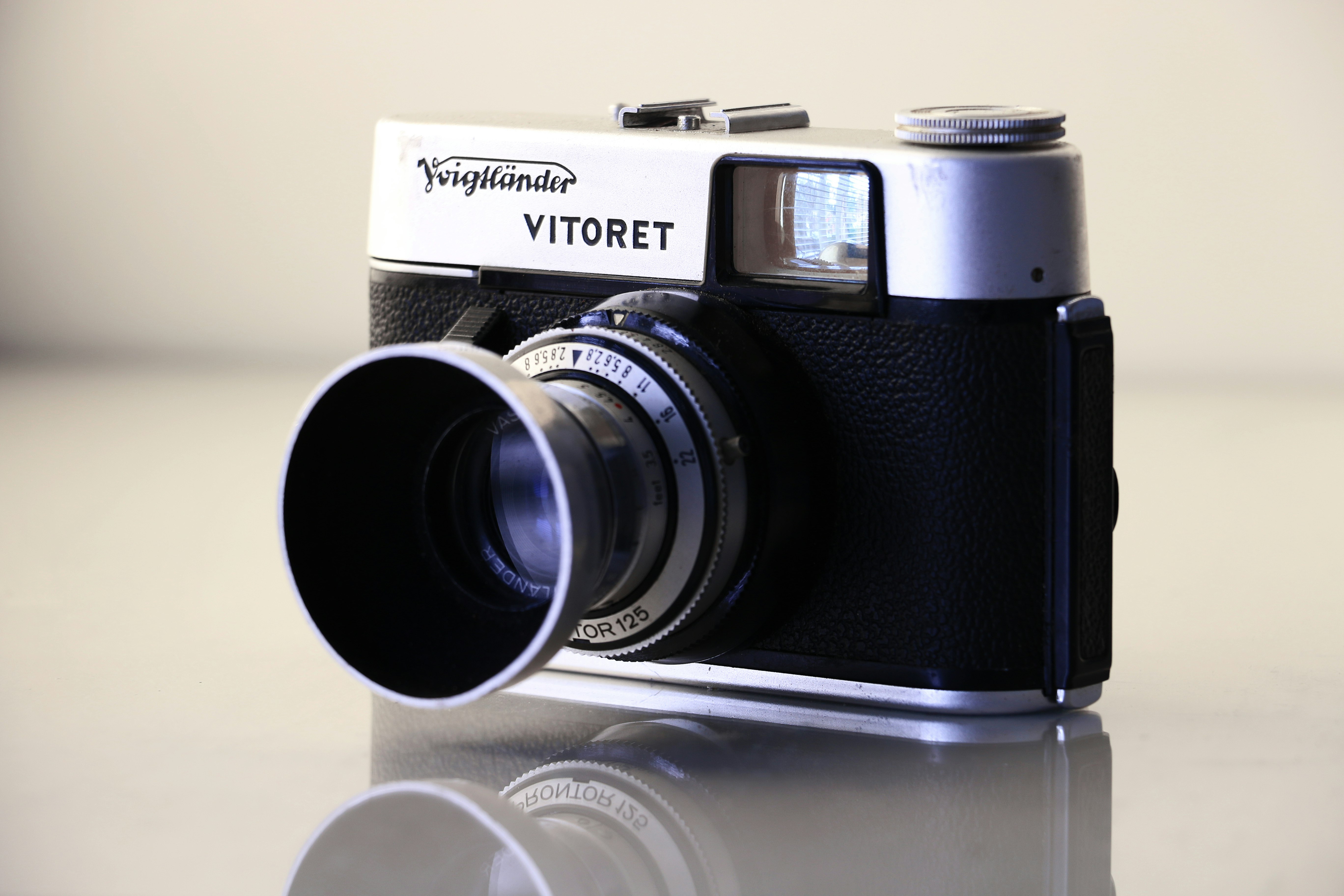 black and gray Vitoret SLR camera